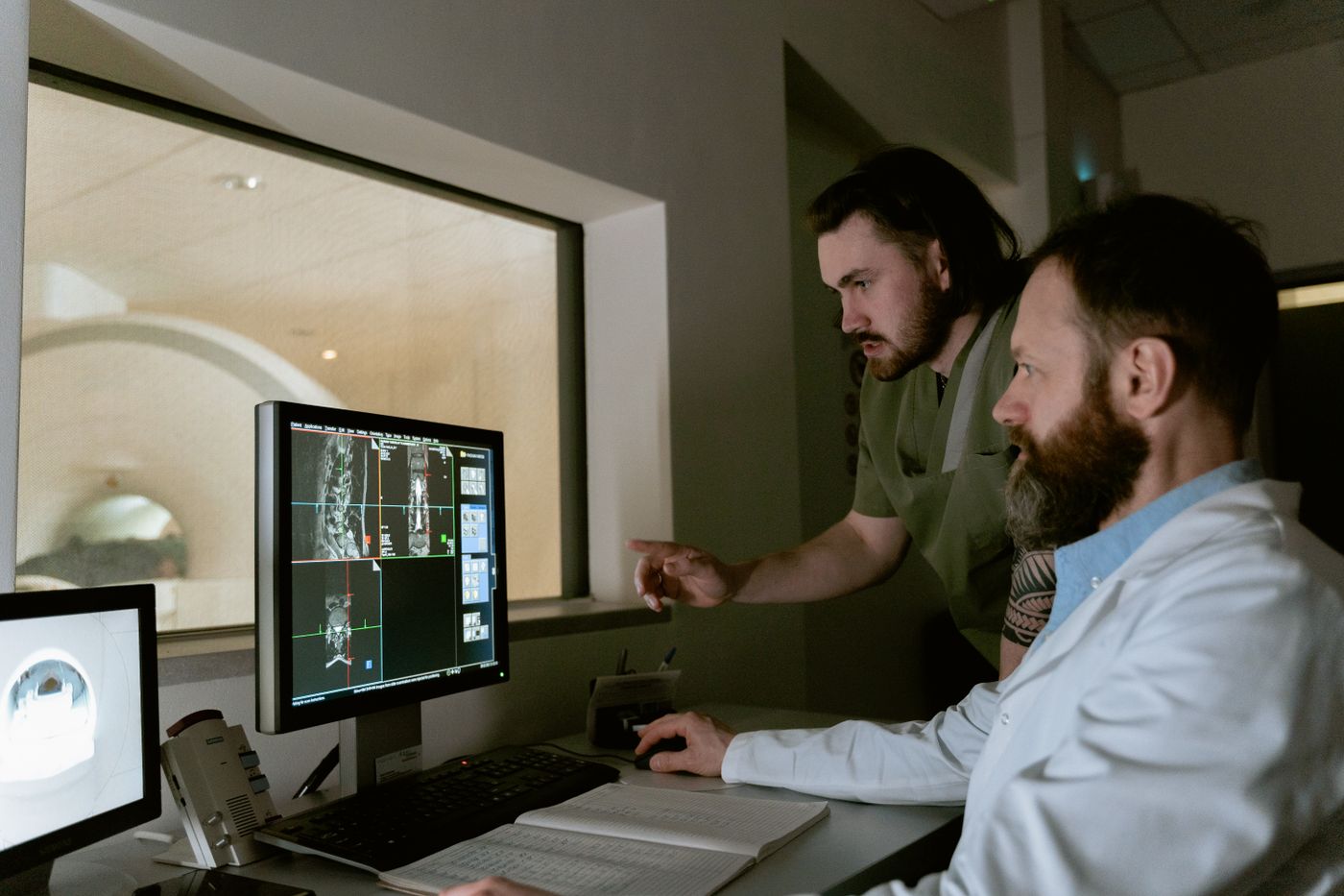 Doctor reviewing medical imaging on a workstation